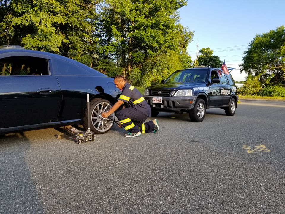 Technician Changing a Tire